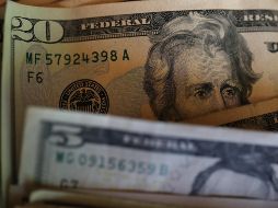 El tipo de cambio para solventar operaciones denominadas en moneda extranjera pagaderas en el país se ubica en 18.7878 pesos. AFP / ARCHIVO