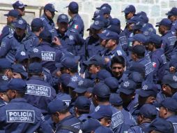 La víspera, el gobierno de Puebla asumió el mando de la Policía Municipal en esa localidad y trasladó a 185 elementos de seguridad local al Centro Único de Evaluación y Control de Confianza, a fin de ser examinados. NTX / ARCHIVO