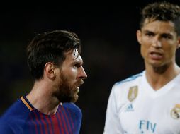 Messi (I) anotó al 53'; Cristiano (D) marcó al 14' y fue sustituido al medio tiempo. AFP/J. Lago