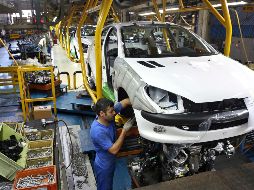 México presentará ya en estos días su contrapropuesta sobre reglas de origen. AP/E. Noroozi