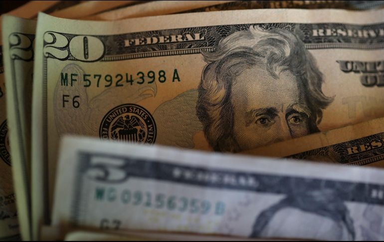 El tipo de cambio es de 19.4232 pesos de acuerdo con el Banco de México.  AFP / ARCHIVO