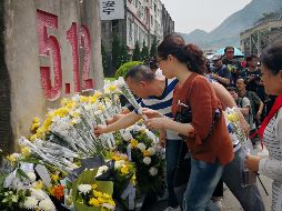 Muchos de los actos de conmemoración se celebraron en las ruinas de la ciudad de Beichuan. AFP