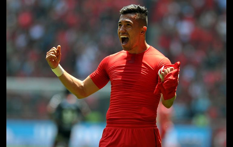 Uribe fue amonestado por quitarse la camiseta al celebrar su primer gol. AFP/R. Váquez