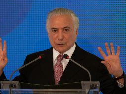 Las autoridades investigan si un decreto sancionado por Temer en mayo del año pasado y que alteró la ley de puertos benefició a la empresa Rodrimar a cambio de sobornos pagados al MDB. EFE / J. Alves