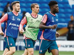 Saúl Ñíguez (izquierda), Antoine Griezmann (centro), Thomas Partey (derecha) y compañía, deberán frenar al volante Dimitri Payet si es que quiere derrotar al Marsella, señala Diego Simeone. EFE