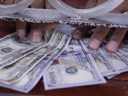 El Banco BASE prevé que el tipo de cambio se cotice entre 19.60 y 19.85 pesos por dólar en cotizaciones interbancarias. EL INFORMADOR / ARCHIVO