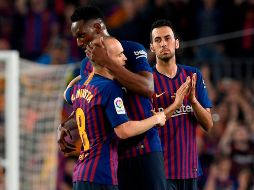 El público no se cansó de corear el nombre del centrocampista azulgrana. AFP/L. Gene