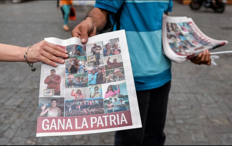 El primer boletín oficial divulgado por el Consejo Nacional Electoral (CNE) indicó que Maduro obtuvo cinco millones 823 mil 728 votos, frente a un millón 820 mil 552 votos de su más fuerte contendor, el candidato independiente Henri Falcón. AFP / L. Robayo