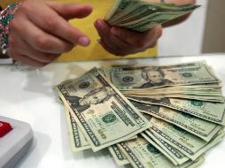 El Banxico fijó en 19.9934 pesos el tipo de cambio para solventar obligaciones denominadas en moneda extranjera pagaderas. EL INFORMADOR / ARCHIVO