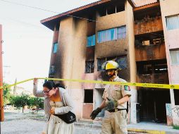 Solidaridad. Ante la afectación registrada, los vecinos se auxilian entre sí. EL INFORMADOR/G. Gallo