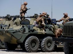 Informan que, durante el enfrentamiento, soldados sirios y rusos abatieron a 43 atacantes y destruyeron seis vehículos militares equipados con armamento pesado. AFP