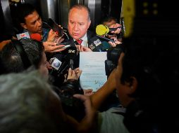 El Ministro, Darío Filártigaa, comparte una conferencia de prensa donde se explica la razón de que el mandatario haya dejado el cargo AFP / N. Duarte