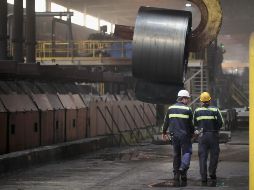 Trump impuso medidas arancelarias a México y Canadá, lo que ha generado respuestas y contribuye a una guerra comercial. AFP / ARCHIVO
