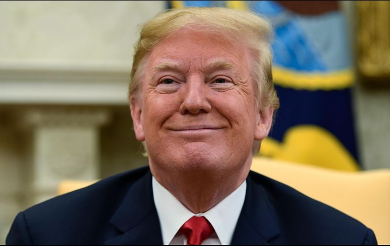 Trump dice que espera que todo siga marchando bien previo a su reunión con Kim Jong - Un. AP/ S. Walsh