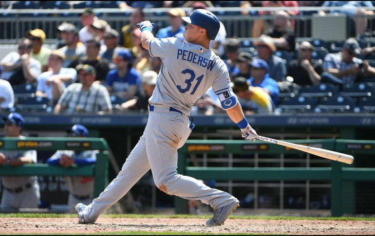 Es la segunda vez en la semana que Pederson hace más de un jonrón en un encuentro. AFP/J. Bert