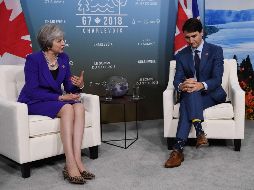 Los primeros ministros de Reino Unido y Canadá sostuvieron un encuentro durante 30 minutos. AFP / L. Neal