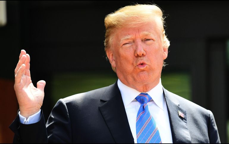 Trump repite su queja principal, afirmando que otros países se han estado aprovechando de Estados Unidos en el comercio. EFE/ N. Hall