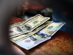 Banco BASE estima que el tipo de cambio cotice entre 20.25 y 20.50 pesos por dólar en operaciones interbancarias a la venta. EL INFORMADOR / ARCHIVO