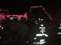 La noche del viernes un autobús de la ruta 275-B cayó a un canal de aguas pluviales. ESPECIAL / UEPCB