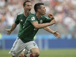 Lozano celebra tras anotar disparando al primer poste de la portería defendida por Manuel Neuer. MEXSPORT/D. Leah