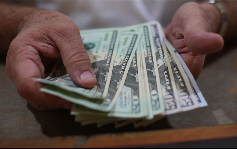 La divisa se adquiere en un mínimo de 18.05 pesos. EL INFORMADOR / ARCHIVO