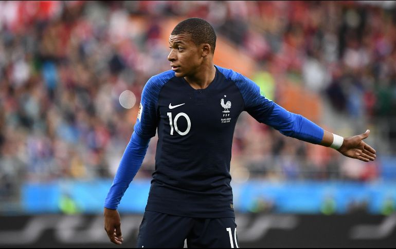 Con 19 años y seis meses, el jugador del PSG supera a David Trezeguet, que había marcado un gol a Arabia Saudita en Francia 1998 con 20 años y 246 días. AFP / F. Fife