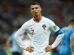 Siempre dependiente de la inspiración de Cristiano Ronaldo, Portugal no encontró en todo el primer tiempo los argumentos suficientes para incomodar a la implacable defensa charrúa. AFP / O. Andersen