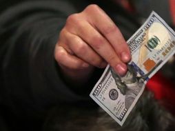 El Banco de México fijó en 19.0790 pesos el tipo de cambio. AFP / ARCHIVO