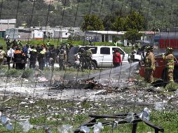 Por la mañana, agentes y peritos de la Fiscalía de Justicia del estado recorrieron la zona afectada por los estallidos en busca de restos humanos. SUN / A. Martínez