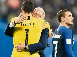 A sanar heridas. Didier Deschamps y Hugo Lloris (#|) reconocen que aún falta un partido, “el más importante”. AFP