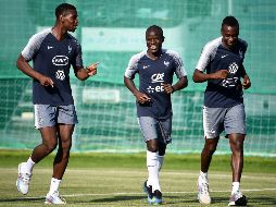 Kanté (C) es admirado de manera unánime; incluso el presidente de la Federación francesa lo ha elogiado. AFP/F. Fife