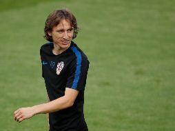 Modric se perfila como candidato a ganar el Balón de Oro y romper el duopolio Messi-Cristiano que impera en ese reconocimiento. AFP/O. Andersen