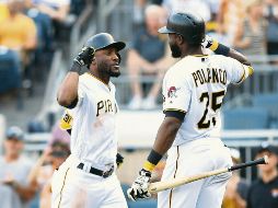 Starling Marte (izq.) y Gregory Polanco (der.) conectaron cuadrangulares ayer. AFP/J. Berl