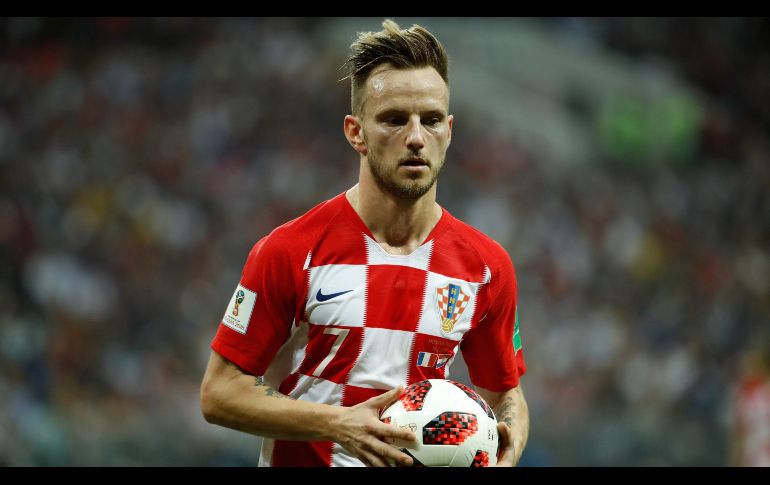 A pesar de la tristeza por la derrota, Rakitic felicita a los Bleus. AFP/O. Andersen