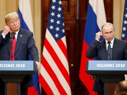 Donald Trump y Vladimir Putin durante la conferencia de prensa tras su charla en privado. EFE/A. Maltsev