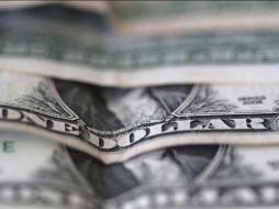 El Banco BASE prevé que el tipo de cambio cotice entre 19.90 y 19.10 pesos por unidad en transacciones interbancarias. EFE / ARCHIVO