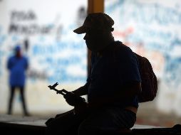 Hombres armados vigilan una de las calles de la ciudad de Masaya, bastión de la disidencia. AFP/M. Recinos