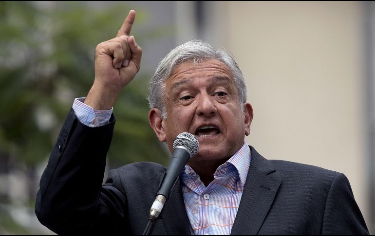 ''La multa impuesta por INE a Morena por 197 MDP es una vil venganza. No existe ningún acto inmoral con el fideicomiso a damnificados por el sismo. Nosotros no somos corruptos'', dice el ganador de la elección presidencial. AFP / ARCHIVO