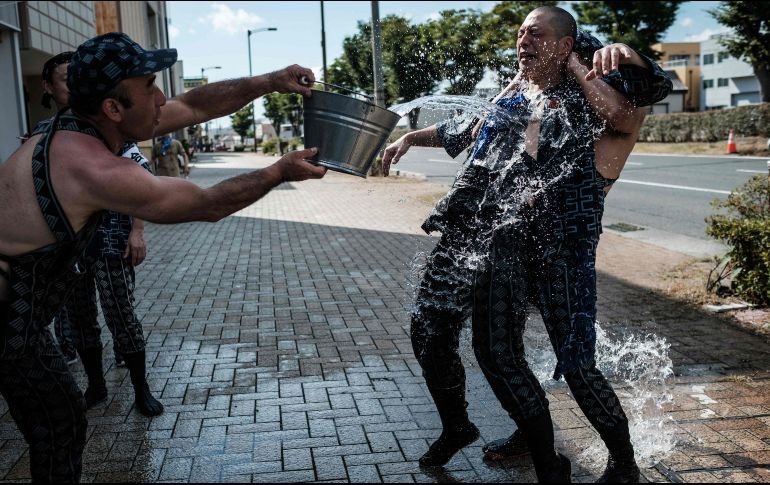 Unas 10 mil personas han tenido que ser hospitalizadas en todo el país por golpes de calor u otras afecciones. AFP/Y. Chiba