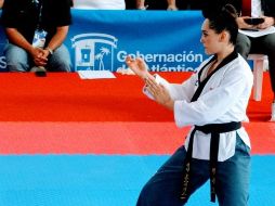 Anteriormente la taekwondoín jalisciense ya había marcado la historia de México en estos JCC, pues ella le dio a la delegación nacional su primera medalla de oro en esta justa, lo hizo en la prueba individual de su especialidad. TWITTER / @CONADE