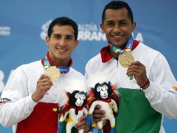 Los clavadistas Jahir Ocampo (derecha) y Rommel Pacheco (izquierda) son dos de los mexicanos merecedores de Oro en Barranquilla. EFE / L. Noriega