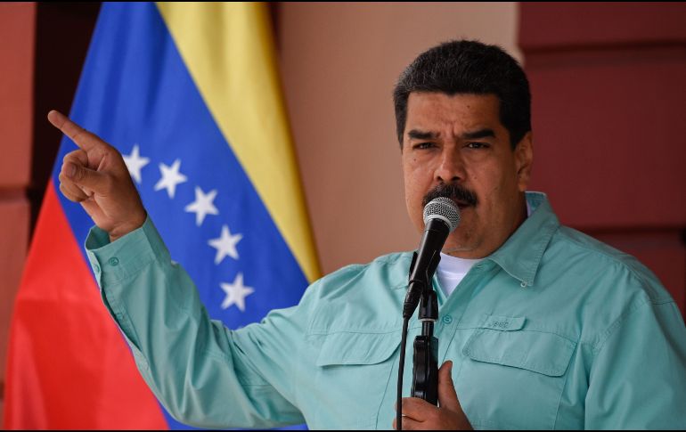 Nicolás Maduro anunció su decisión de que esta medida reduzca cinco ceros al bolívar venezolano y no tres como había ordenado anteriormente. AFP / ARCHIVO