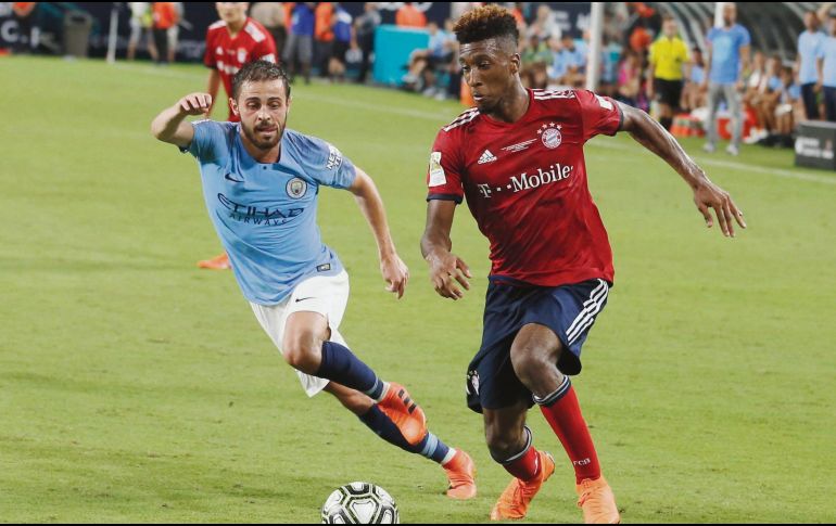 Doblete de Bernardo Silva (derecha) da el triunfo al City. AFP