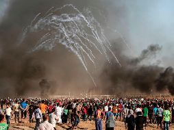 Desde el comienzo de las protestas en la Franja, los balones y cometas incendiarias han provocado más de 700 incendios. AFP/M. Hams