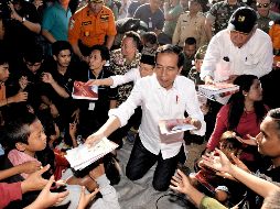 El presidente Joko Widodo visitó un refugio, y entregó a los damnificados víveres y otros materiales. AFP/A. Suparto