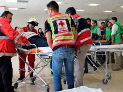 De las 17 personas que se encontraban hospitalizadas hasta la tarde de ayer jueves, seis fueron dadas de alta. AP / Cruz Roja Durango