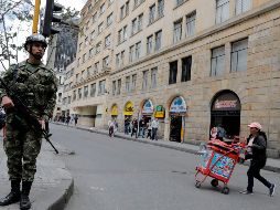 En la ceremonia, seis mil policías trabajarán por cuadrantes y otros seis mil desde sus especialidades para proteger a los cerca de cuatro mil invitados al evento presidencial. AFP/ J. Vizcano