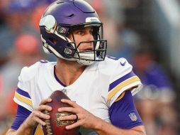 Efectivo. Kirk Cousins mostró buenas hechuras en los pocos minutos que jugó ayer en Denver. AFP/D. Bradford