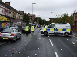 Fuerzas de seguridad resguardan el área en lo que se realizan las investigaciones correspondientes. AFP/O. Scarff