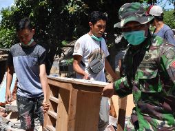 El cálculo provisional de los daños ronda los 5.04 billones de rupias. AFP/A. Berry